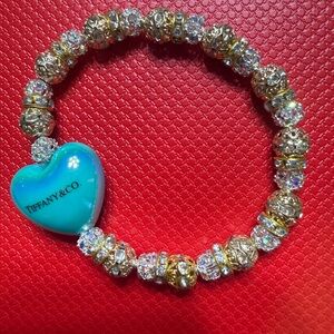 Tiffany & Co. Gold and Silver Bracelet with Blue Heart